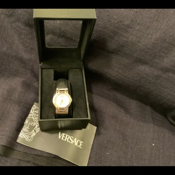original VERSACE round silver face with black leather strap